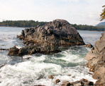 The waves from the Pacific Ocean wash in and mix with the warm water at Hot Springs Cove north of Tofino